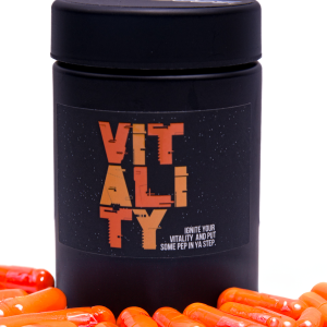 StarDust Vitality Wellness Supplement in a container facing front with pills underneath it