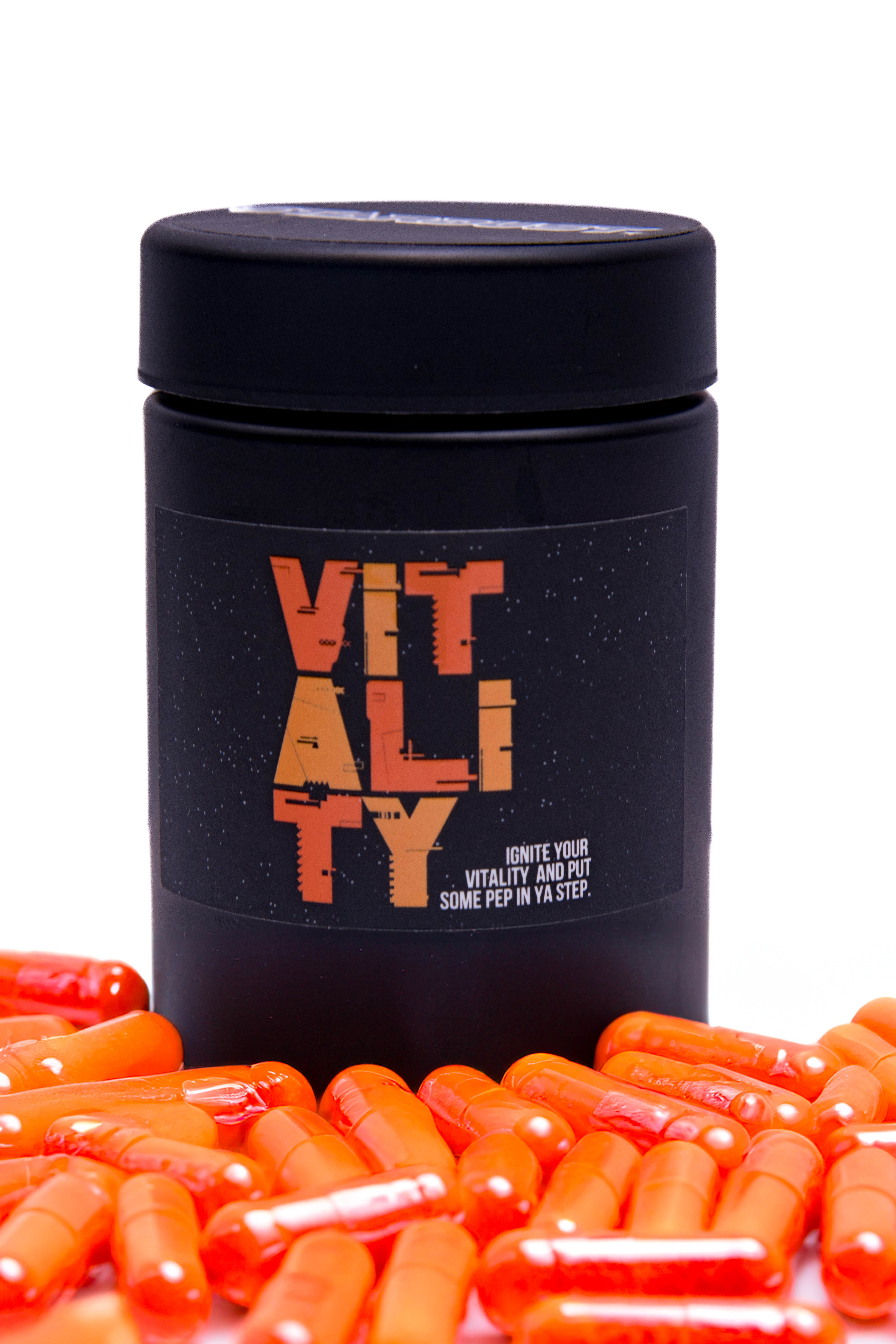 StarDust Vitality Wellness Supplement in a container facing front with pills underneath it