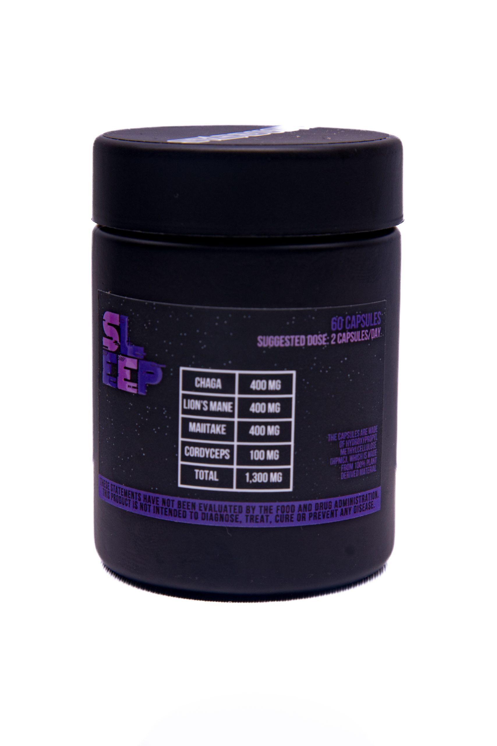 StarDust Sleep Capsule Wellness Supplement in a container showing list of natural ingredients on the back